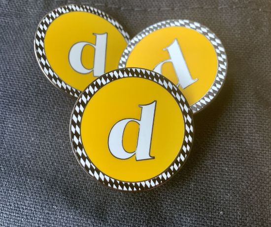 Picture of Yellow "d" Enamel Pin